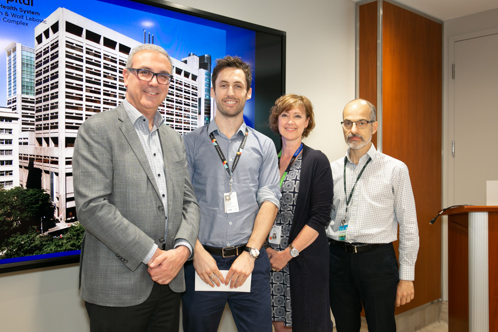 Dr. Gary Newton with Donald E. Low Bursary recipient Dr. Kevin Barker (centre) and Lynn Ardizzi