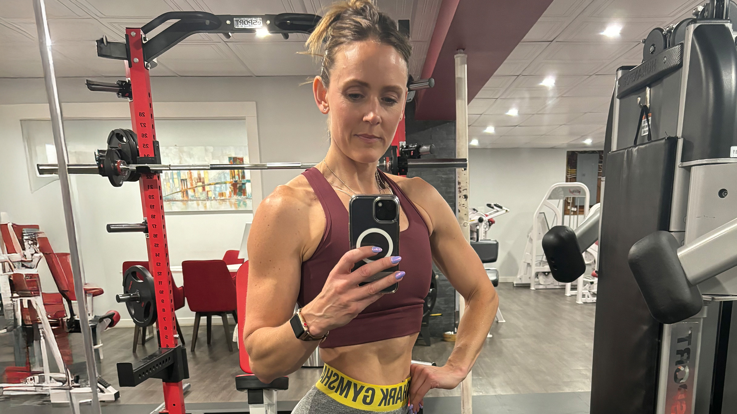 Woman standing in a gym