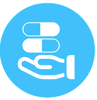 hand holding two pills