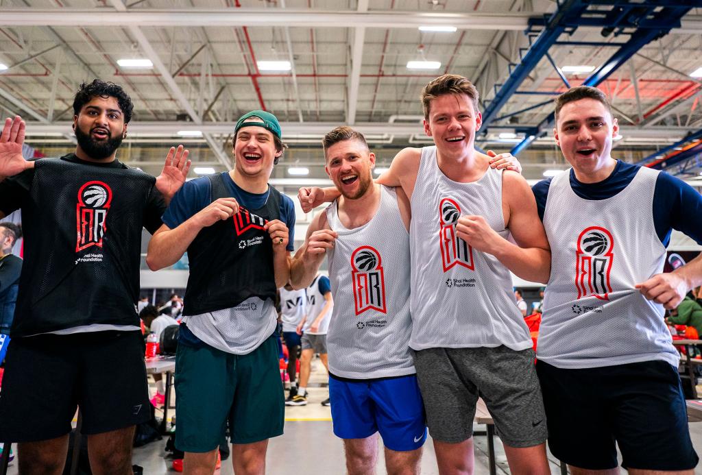 Group of basketball players at Raptors for Research event