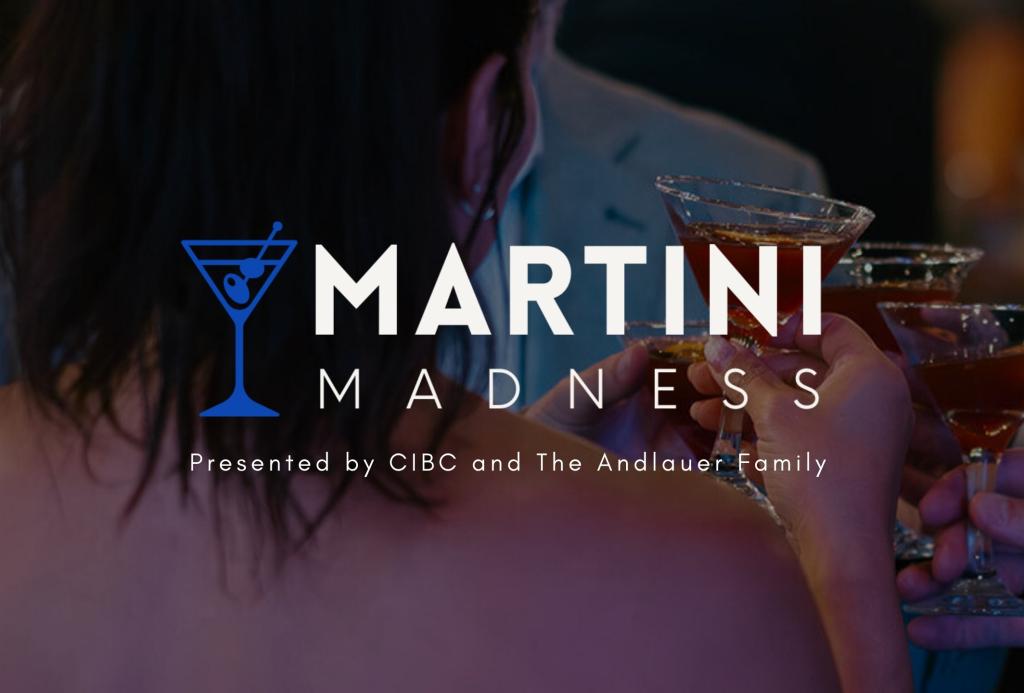 person holding a martini glass at a party
