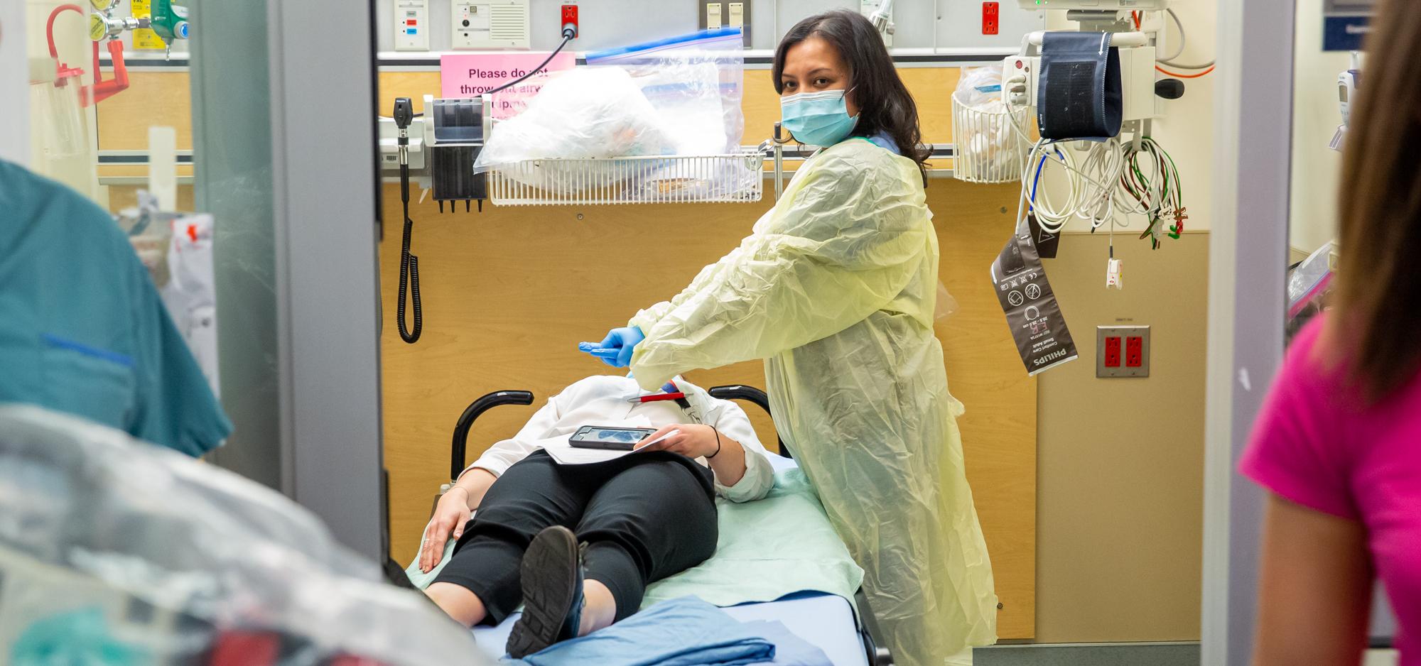 Woman doctor is helping patient