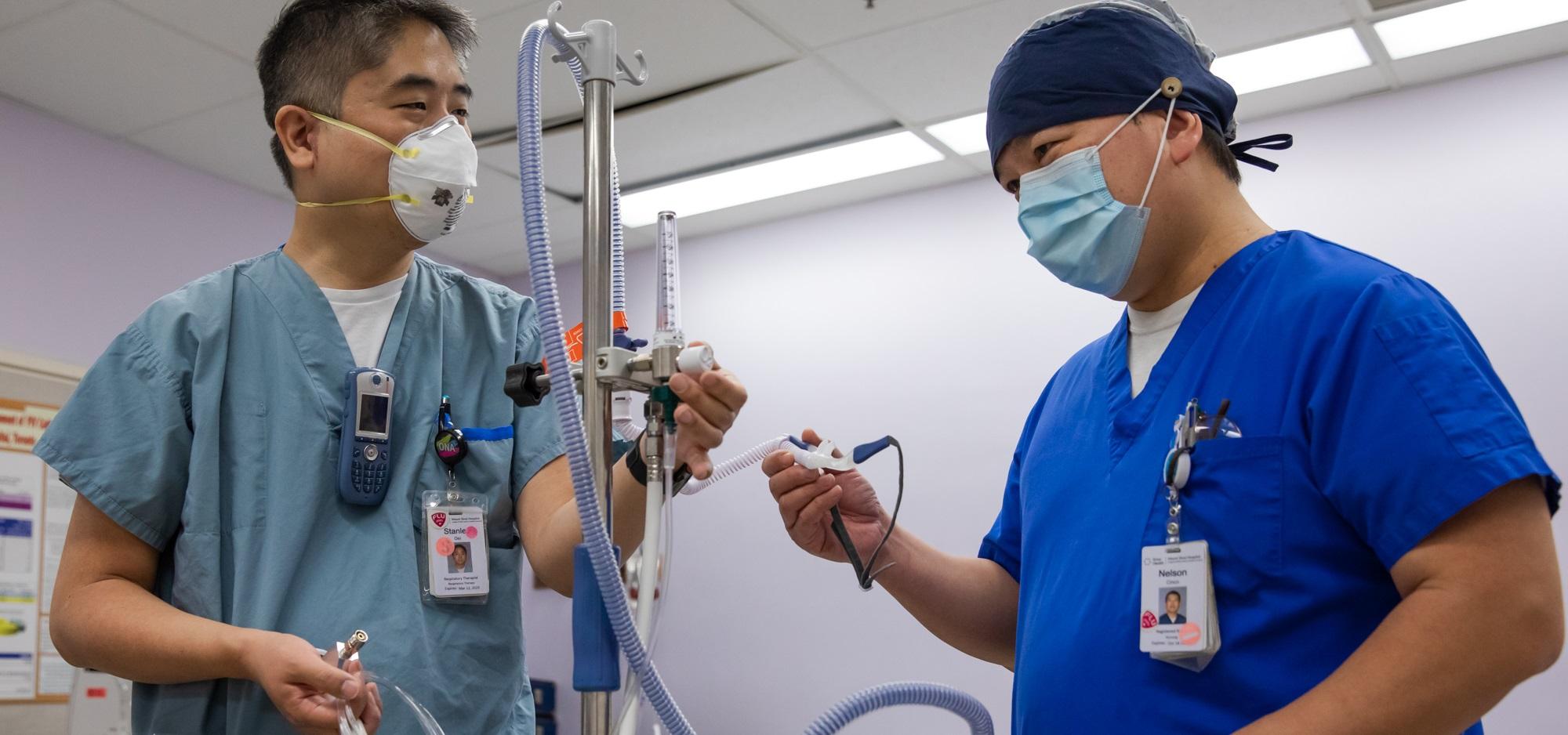 Respiratory Therapist demonstrates equipment used in high flow nasal cannula oxygen therapy