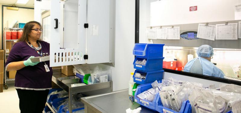 Two people working in a pharmacy.