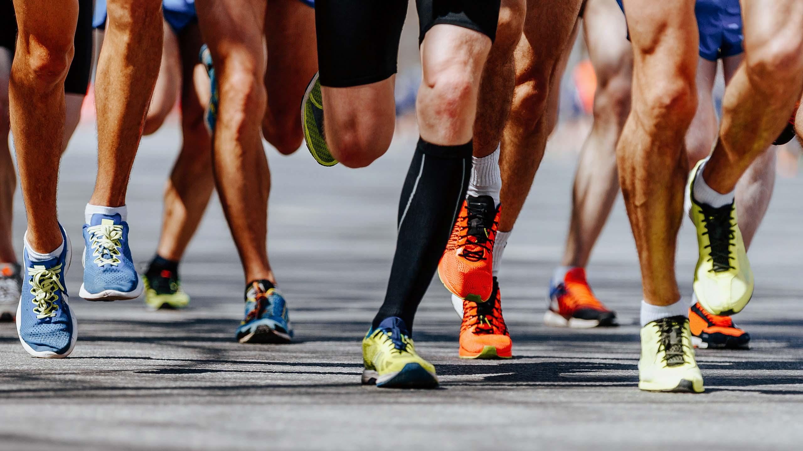 Legs of people running