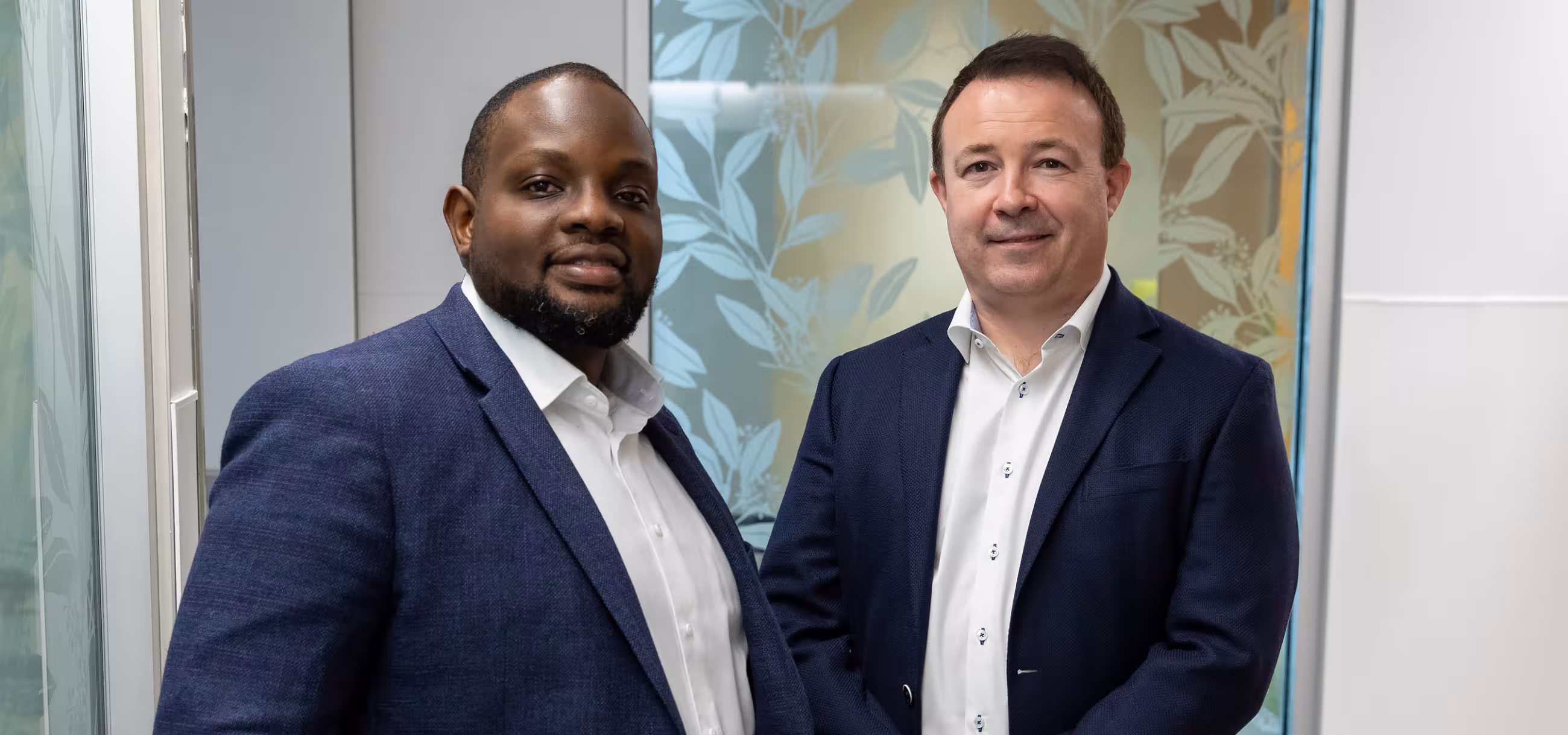 Head shots of Sinai Health oncologists, Dr. Abdulazeez Salawu (left) and Dr. Geoffrey Watson (right).