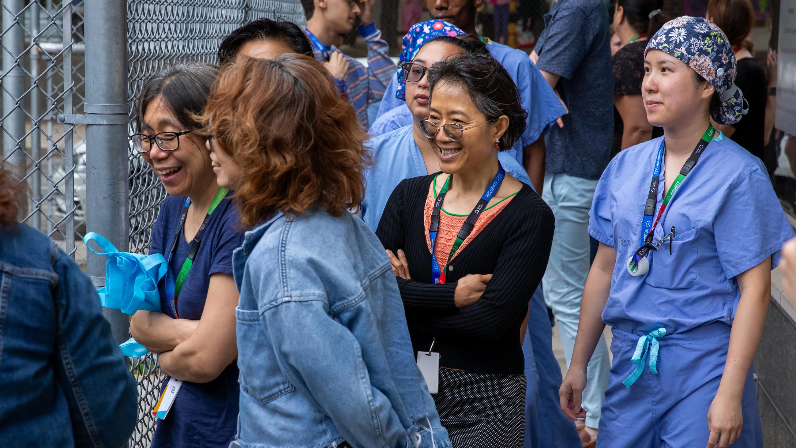 Hospital workers lining up for the barbeque. 
