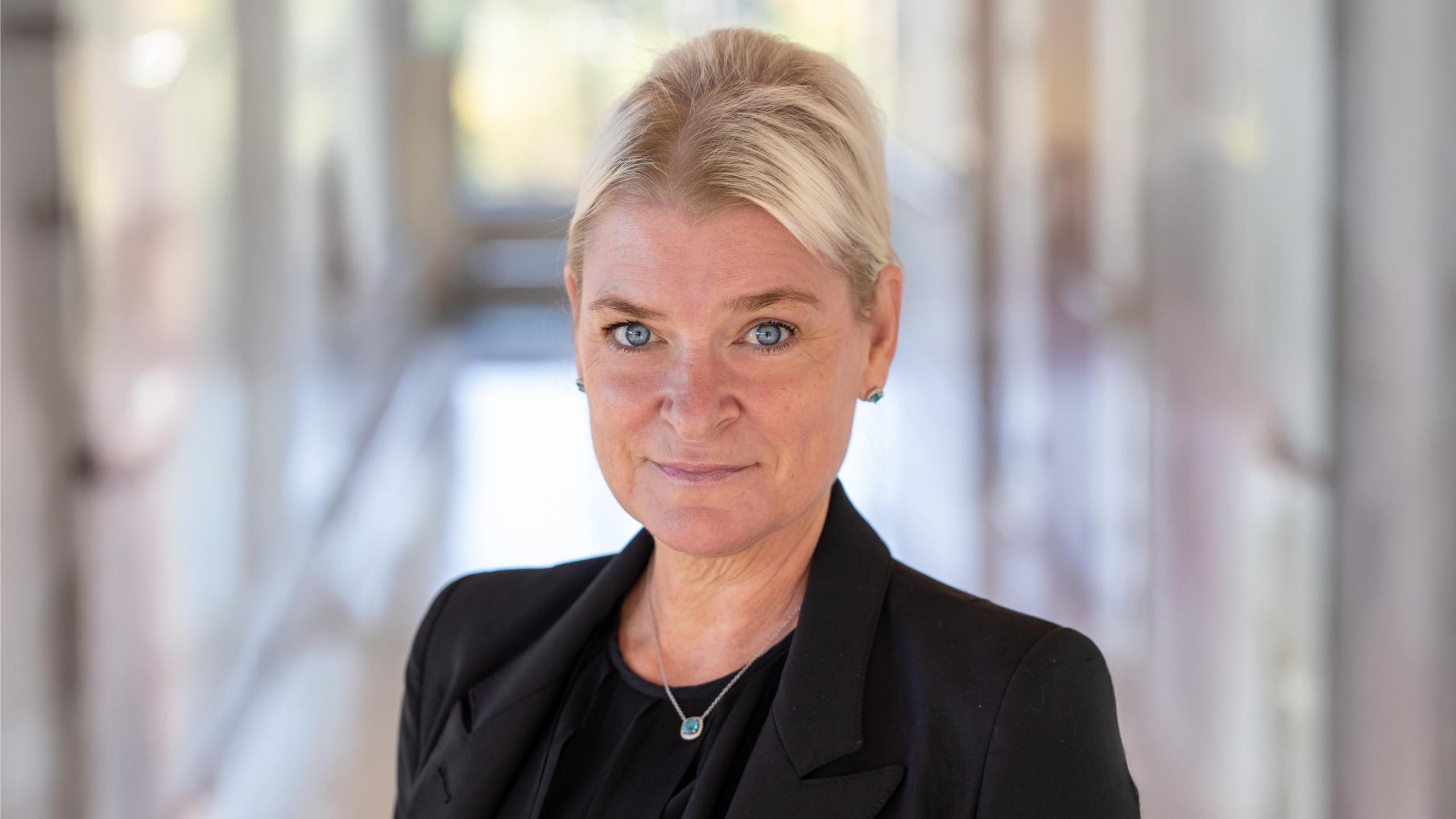 woman wearing black blazer