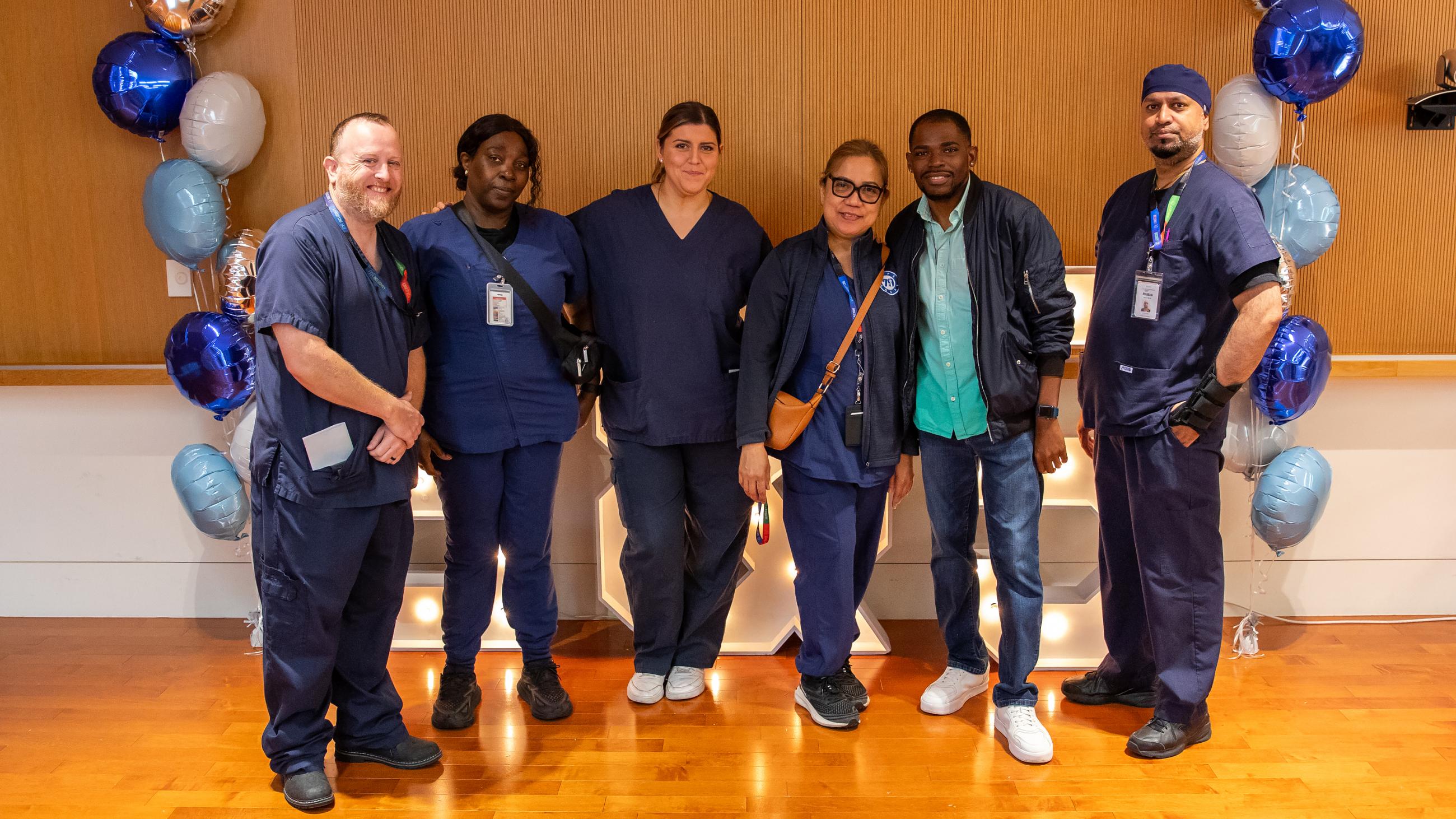 People celebrating together at Sinai Health’s Service Celebration.