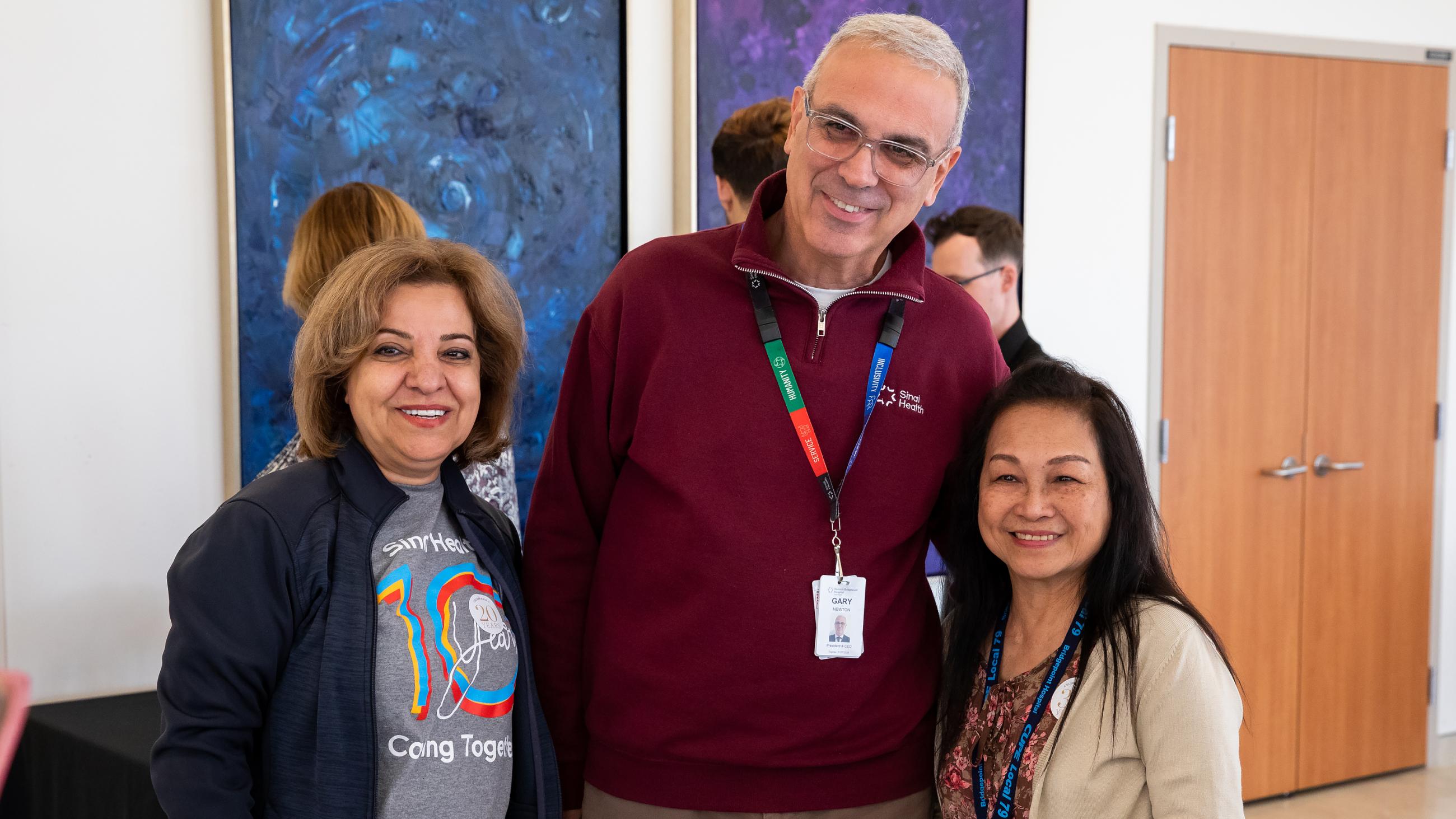 People celebrating together at Sinai Health’s Service Celebration.