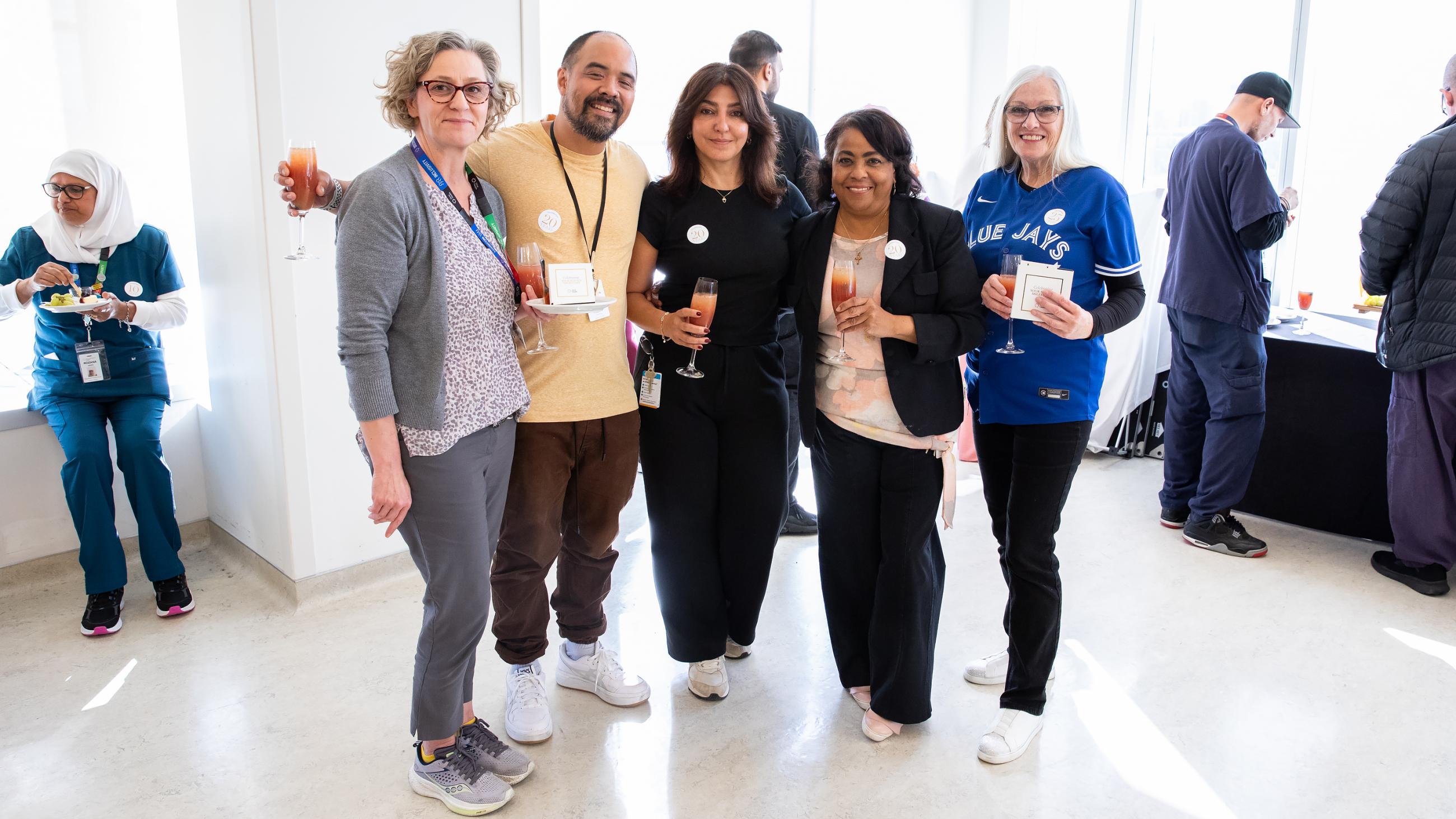 People celebrating together at Sinai Health’s Service Celebration.