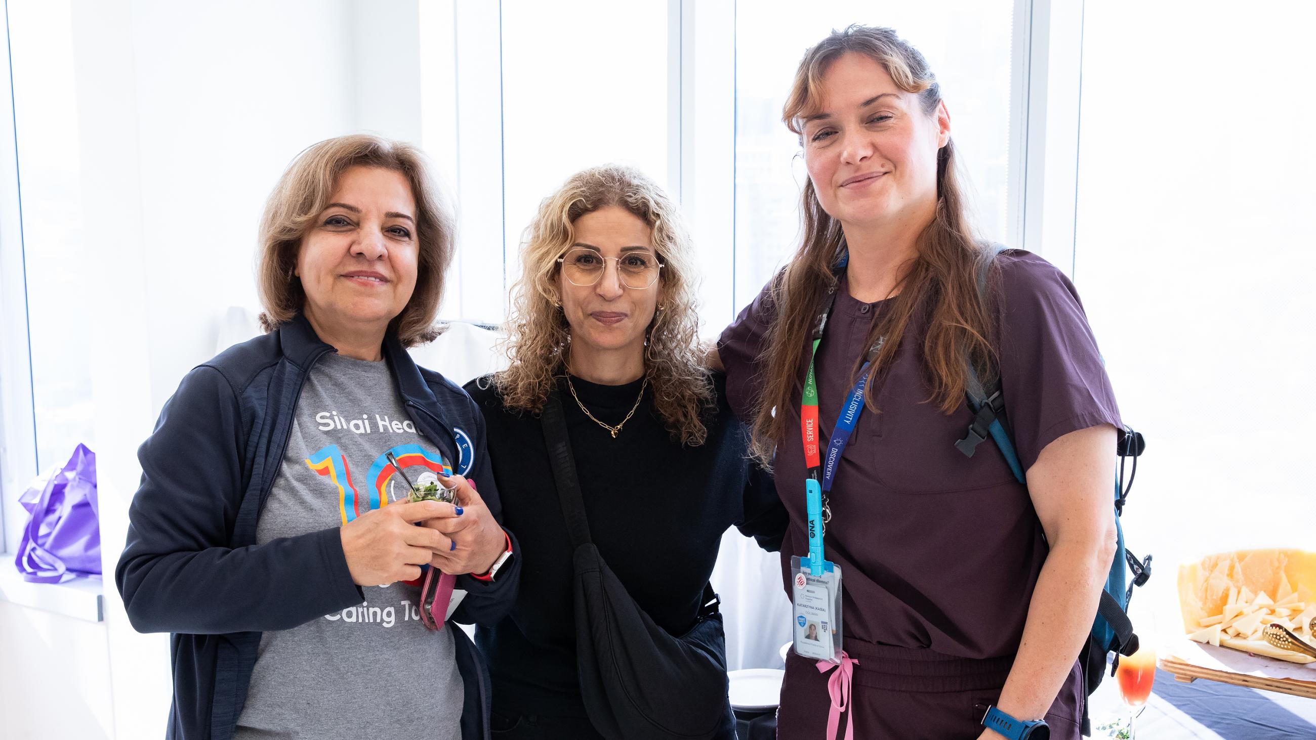 People celebrating together at Sinai Health’s Service Celebration.