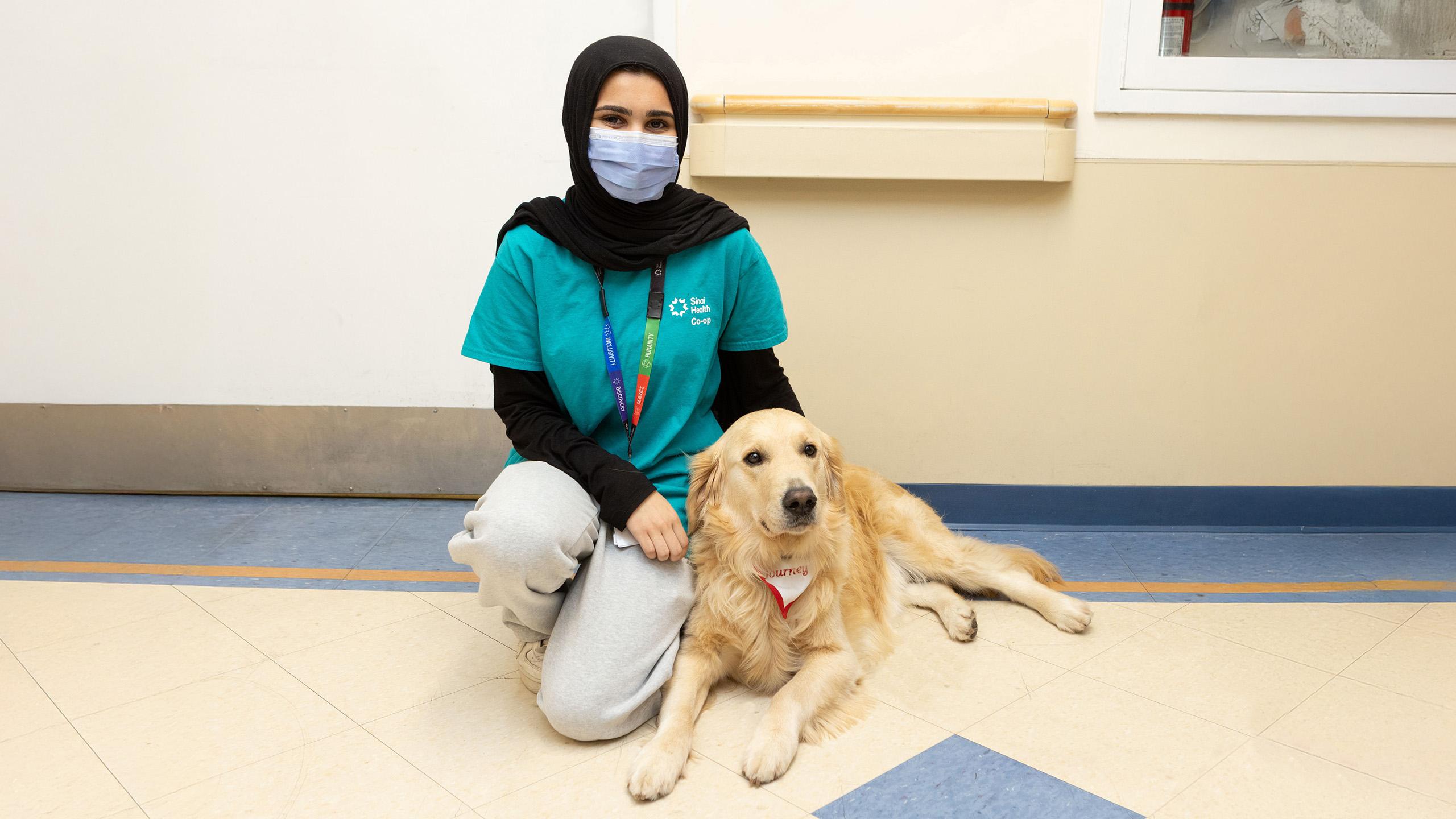 woman with golden retriever
