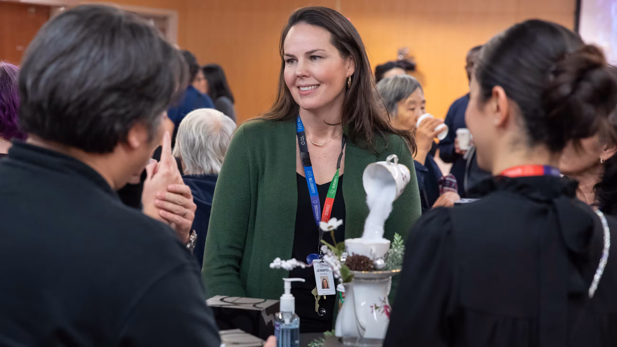 People celebrating together at Sinai Health’s Holiday Open House.