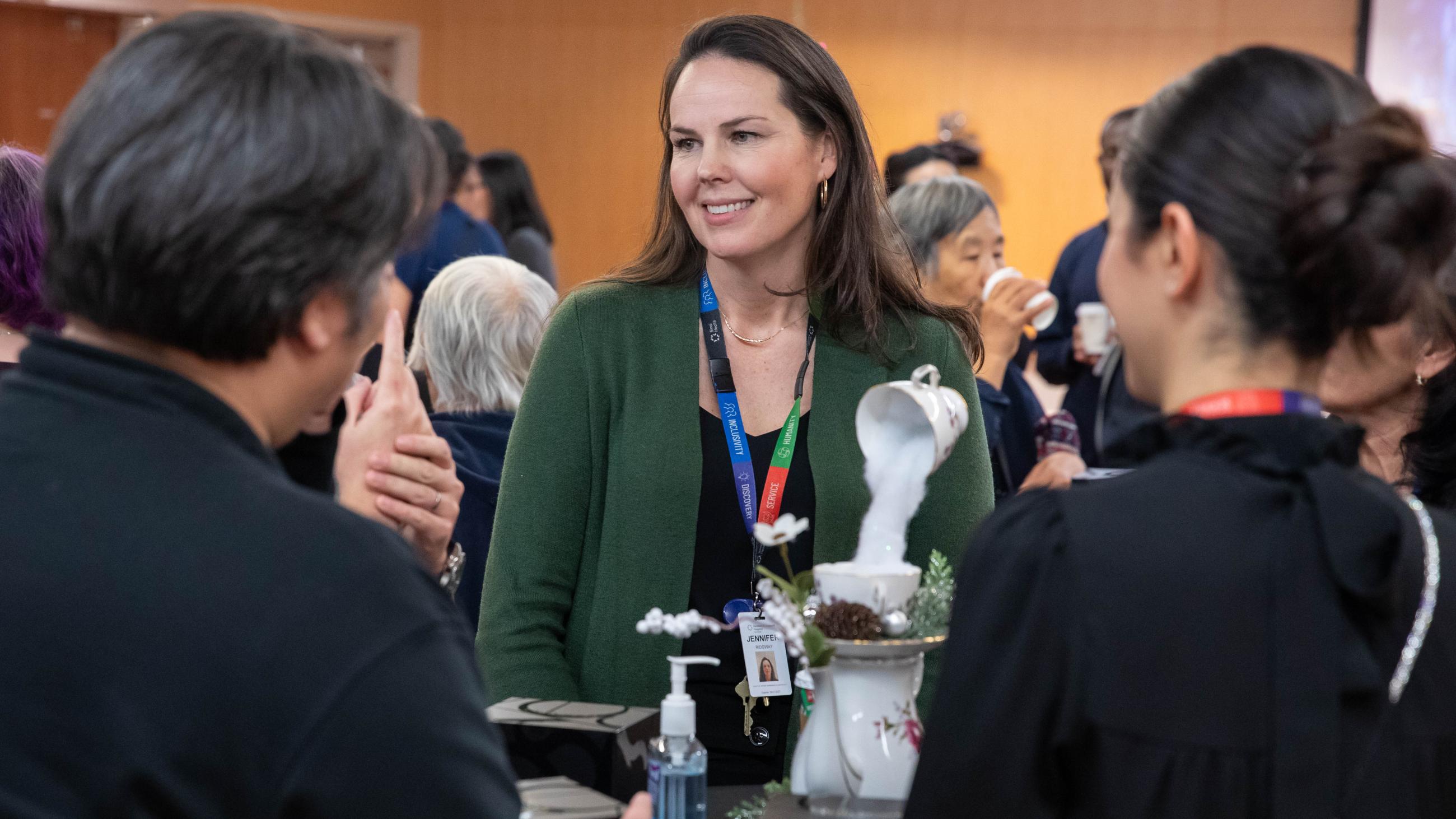 People celebrating together at Sinai Health’s Holiday Open House.