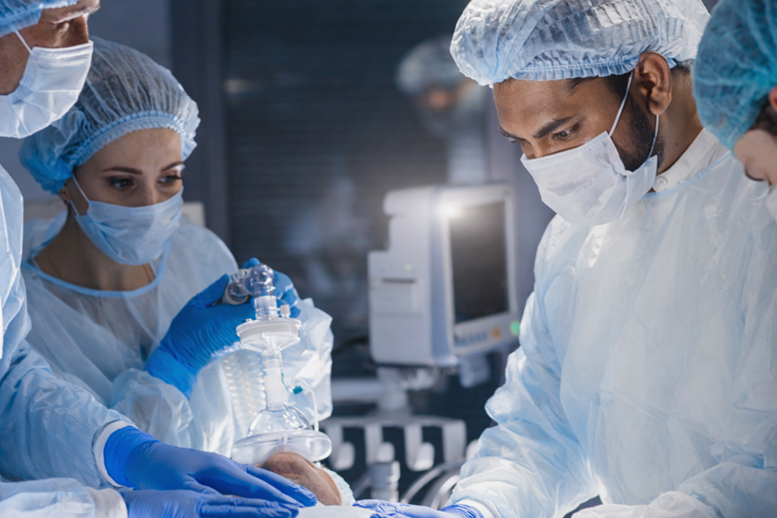 Healthcare professionals working together in a clinical setting.