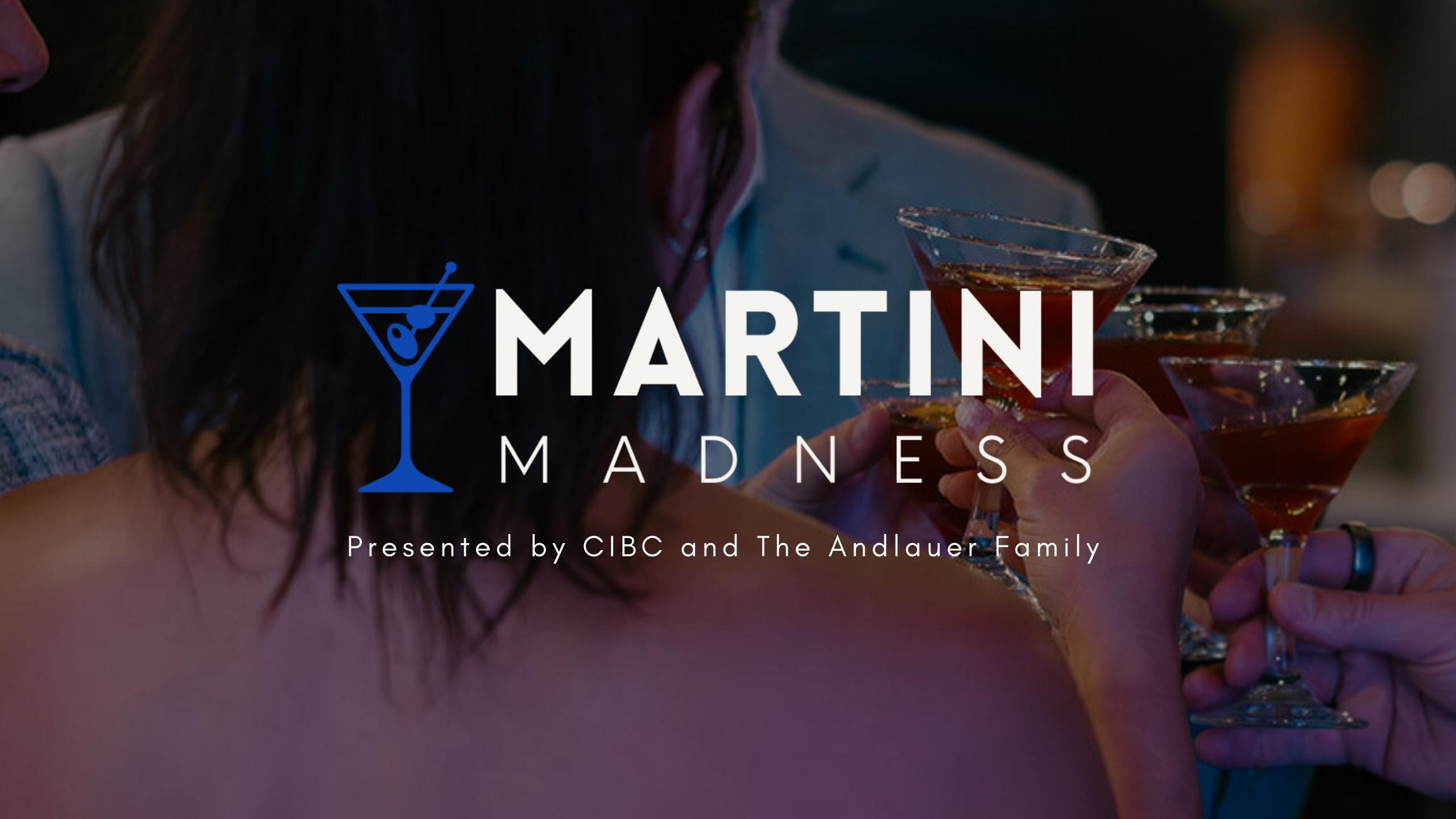 person holding a martini glass at a party