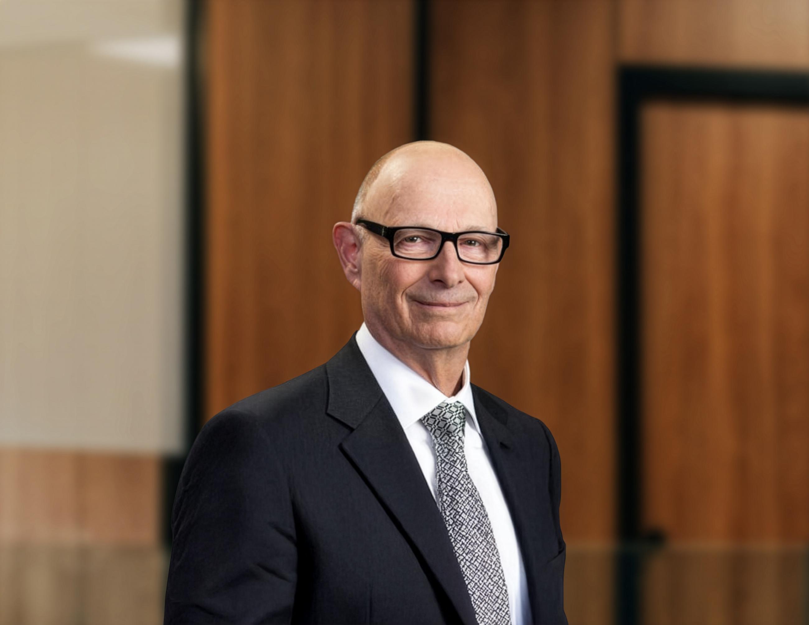 man wearing suit and glasses