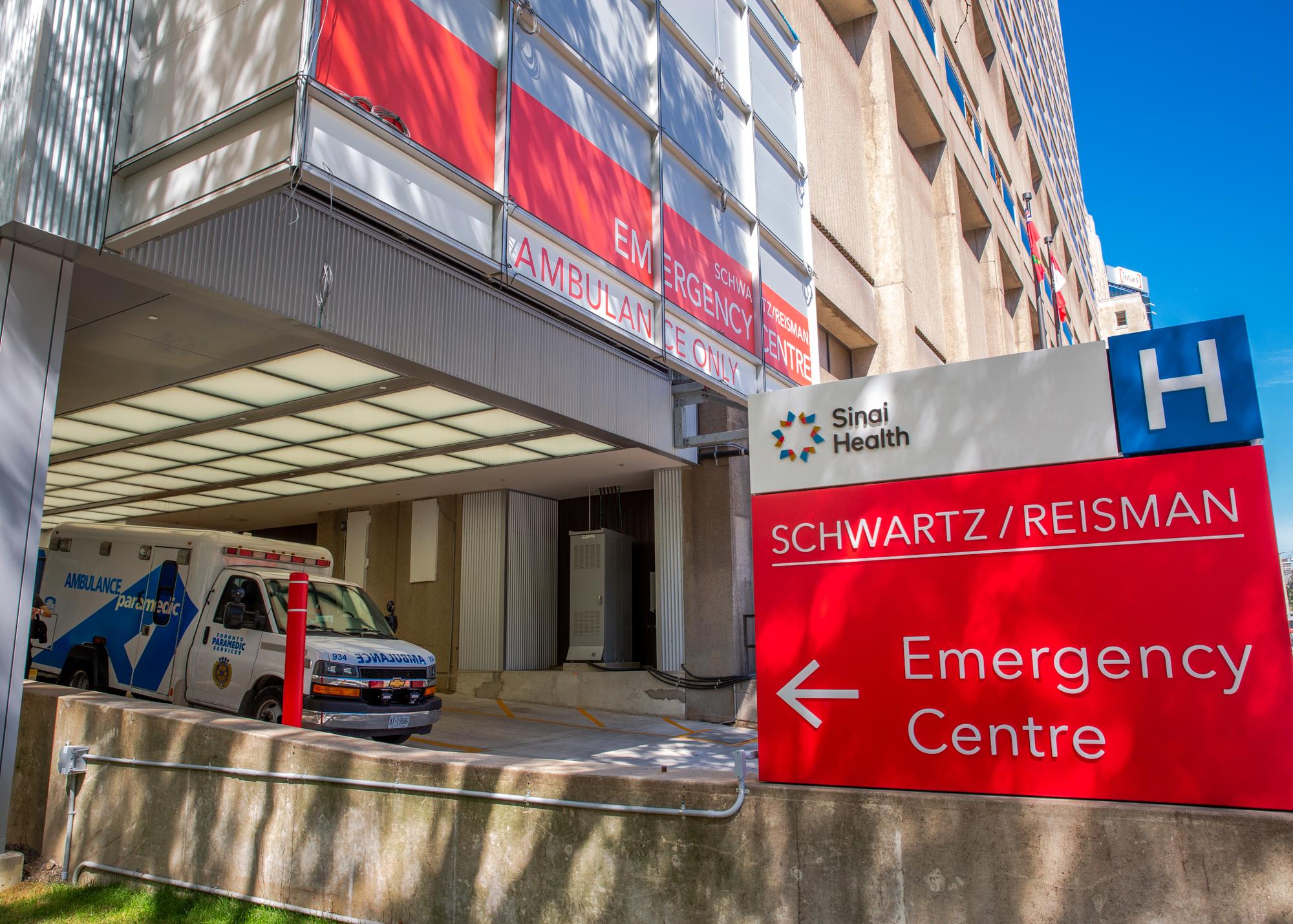 Ambulance parked outside the Emergency Department entrance at Mount Sinai Hospital in Toronto.