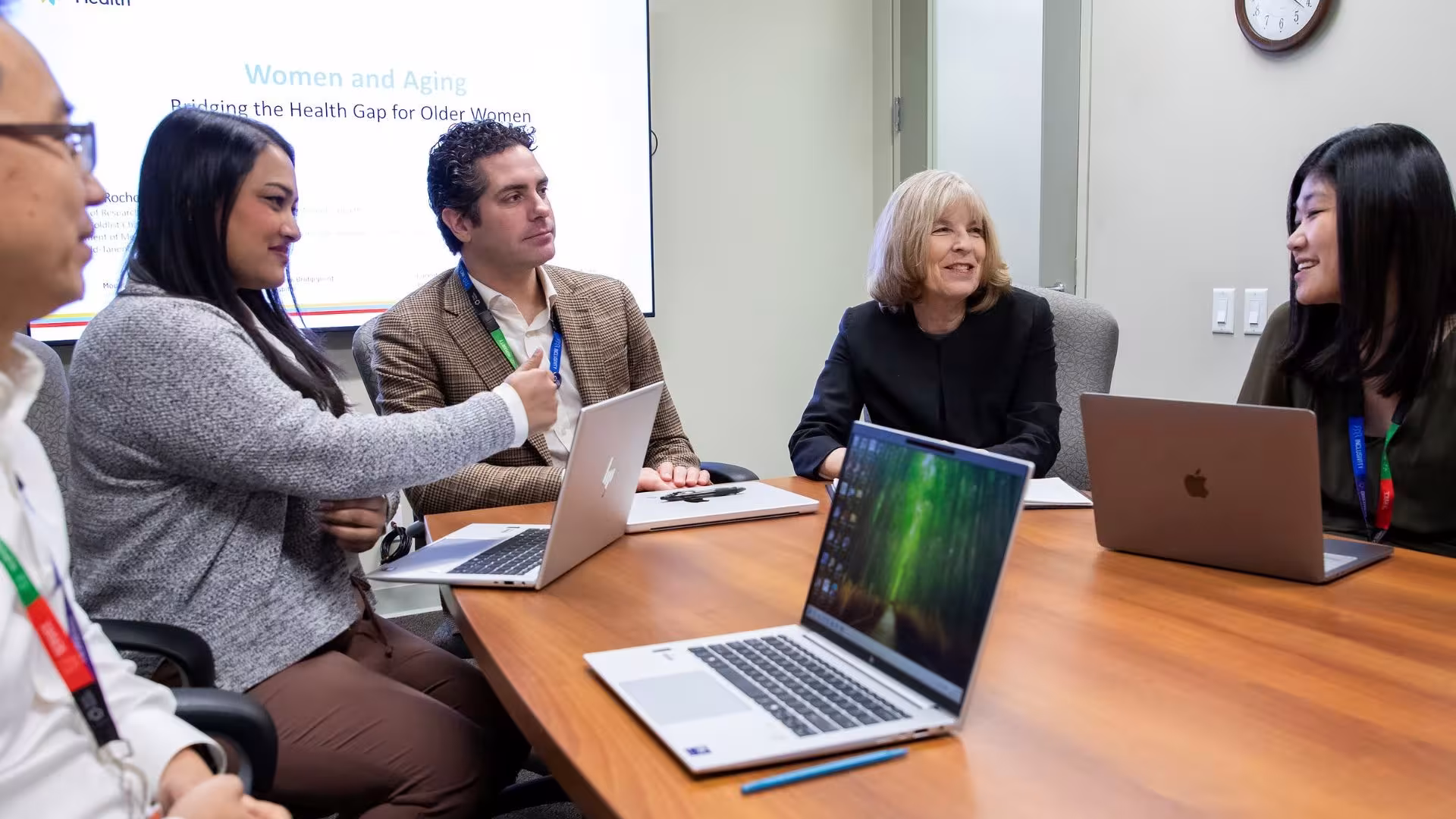 Dr. Paula Rochon, Director of Research at The Weston and O’Born Centre for Mature Women’s Health, leads a multidisciplinary team discussion with colleagues, including Dr. Nathan Stall, Geriatrics Site Lead at Mount Sinai Hospital. 