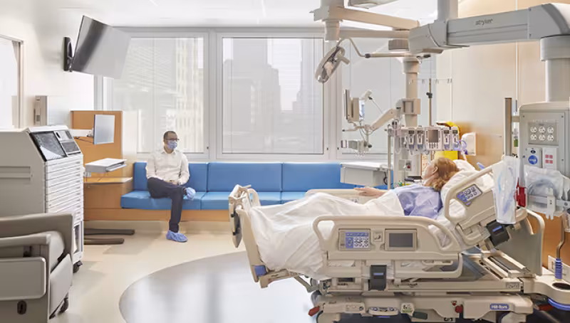 patient in bed in new modern ICU room