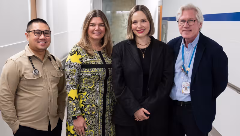 Kate W stands alongside her Mount Sinai Hospital care team at the Chris Hugh Sharp Cancer Centre. From left to right: Jordan Rivera, Dr. Christine Brezden-Masley, Kate Walker and Dr. Jonathan Hunter.