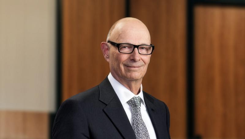 man wearing suit and glasses