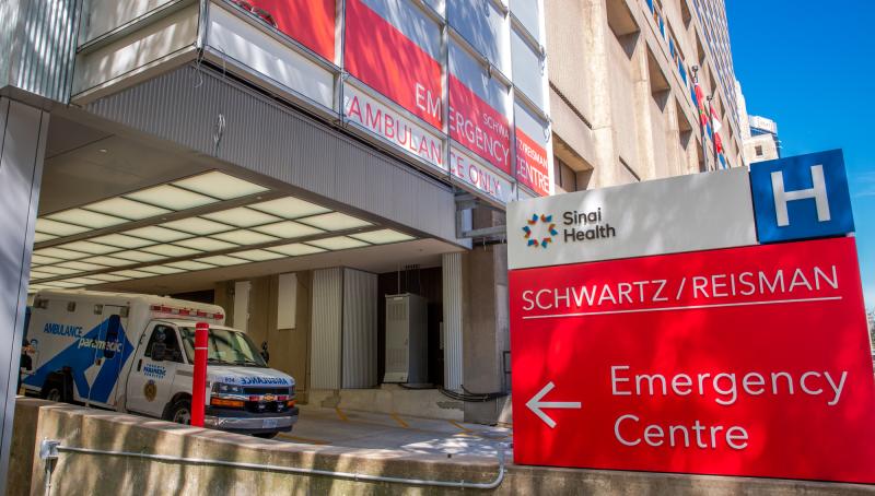 Ambulance parked outside the Emergency Department entrance at Mount Sinai Hospital in Toronto.