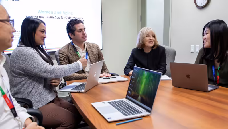 Dr. Paula Rochon, Director of Research at The Weston and O’Born Centre for Mature Women’s Health, leads a multidisciplinary team discussion with colleagues, including Dr. Nathan Stall, Geriatrics Site Lead at Mount Sinai Hospital. 