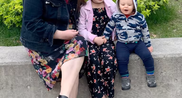 Eugenia Lopes with her son and daughter