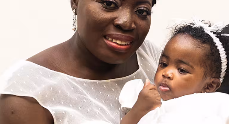 Solace Attopley with her infant daughter, Emmanuella
