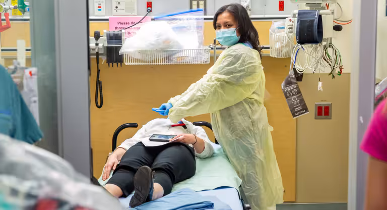 Woman doctor is helping patient