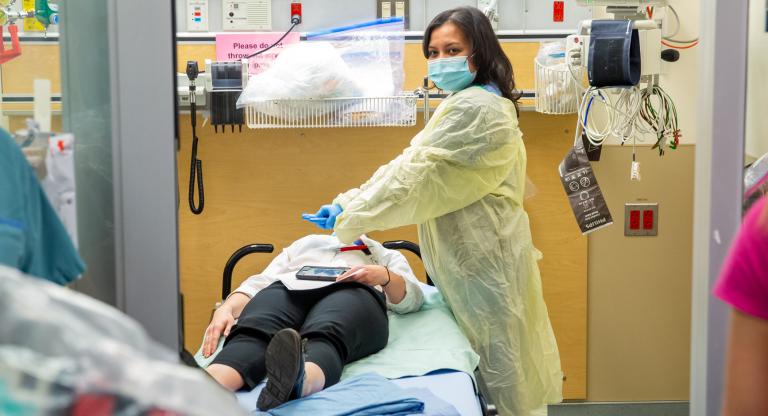 Woman doctor is helping patient