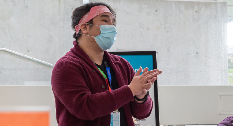 Roland de Vega, Academic Affairs Coordinator at Bridgepoint Active Healthcare, screens employees, patients and essential care partners for COVID-19 symptoms