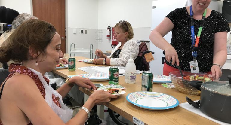 Hennick Bridgepoint patients enjoying Occupational Therapy, cooking a meal together
