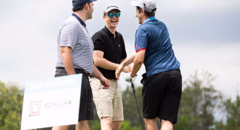 Golfers at the Swing for Sinai gold tournament