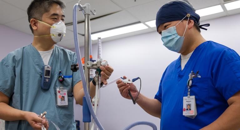Respiratory Therapist demonstrates equipment used in high flow nasal cannula oxygen therapy 