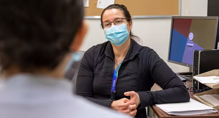 Dr. Erin Kennedy speaks with a patient.