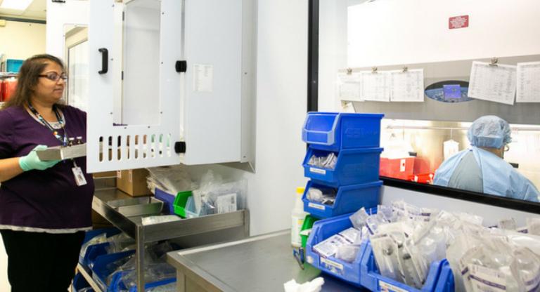 Two people working in a pharmacy.