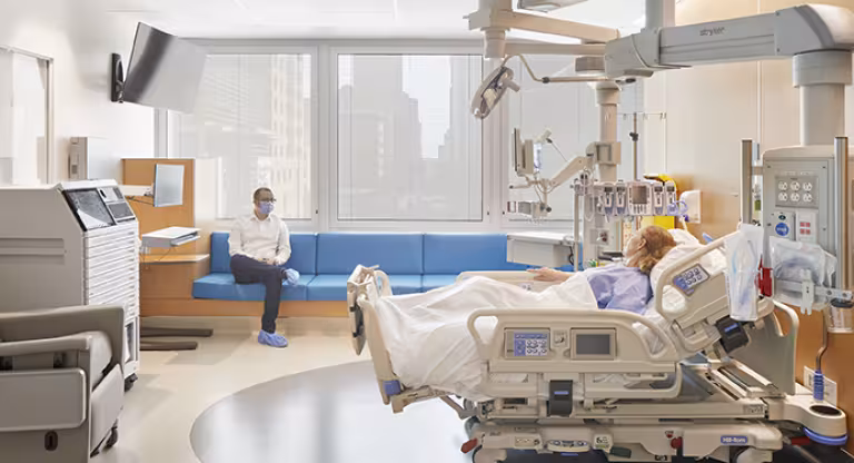 patient in bed in new modern ICU room