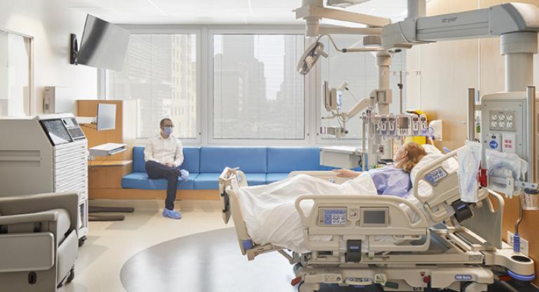 patient in bed in new modern ICU room