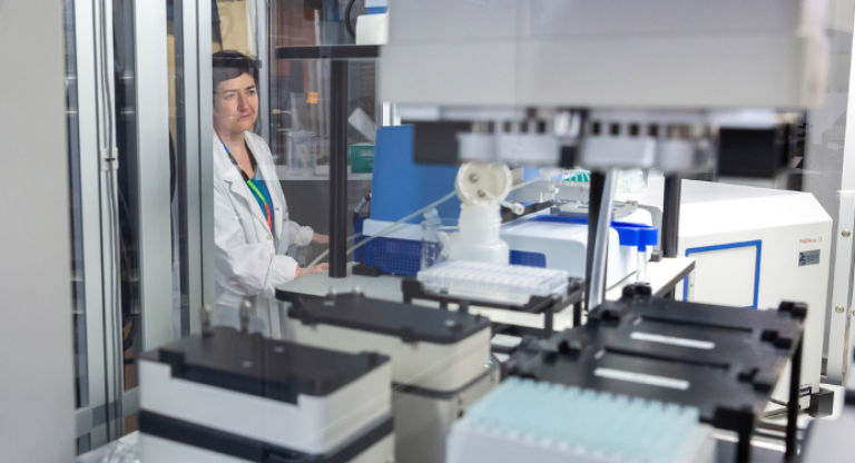 Dr. Anne-Claude Gingras works in the lab.