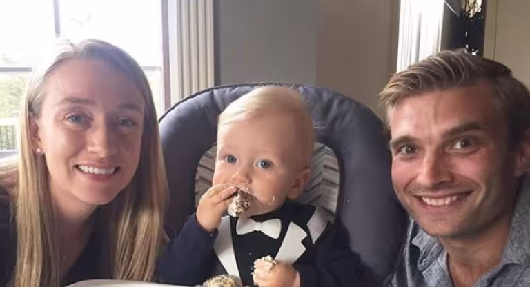 Steve Thompson with partner and baby.