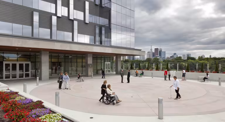 People walk the labyrinth outside Hennick Bridgepoint hospital 