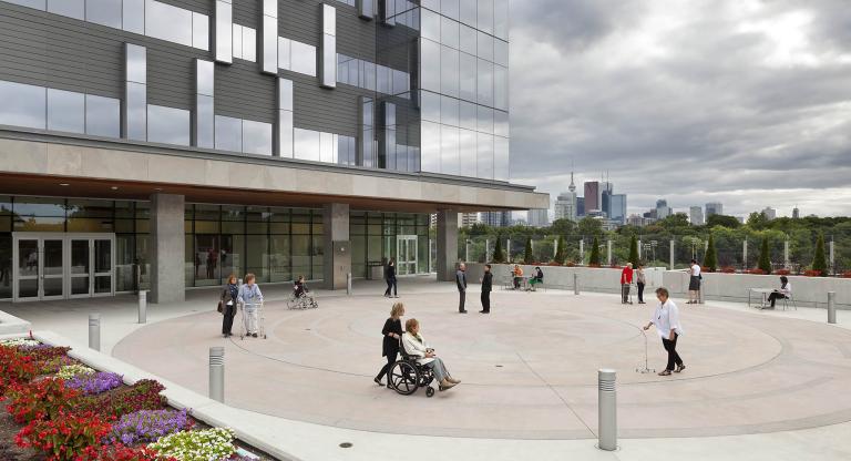 People walk the labyrinth outside Hennick Bridgepoint hospital