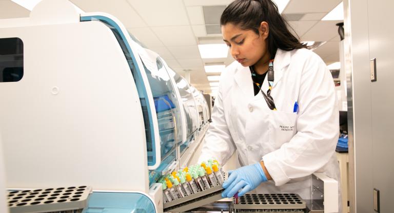 Mount Sinai Department of Pathology and Laboratory Medicine employee collecting patient samples.