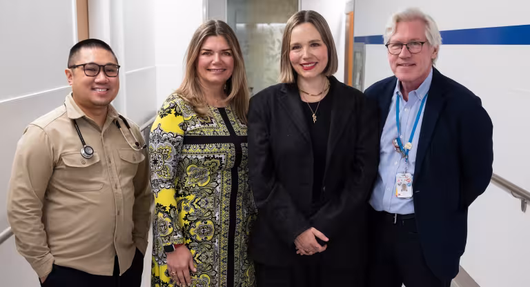 Kate W stands alongside her Mount Sinai Hospital care team at the Chris Hugh Sharp Cancer Centre. From left to right: Jordan Rivera, Dr. Christine Brezden-Masley, Kate Walker and Dr. Jonathan Hunter.