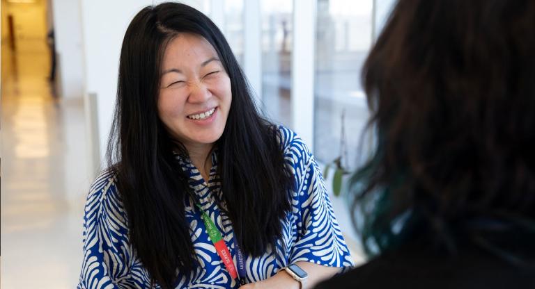 Geriatric psychiatrist Dr. Gina Eom speaks to a patient at Hennick Bridgepoint Hospital in Toronto. 