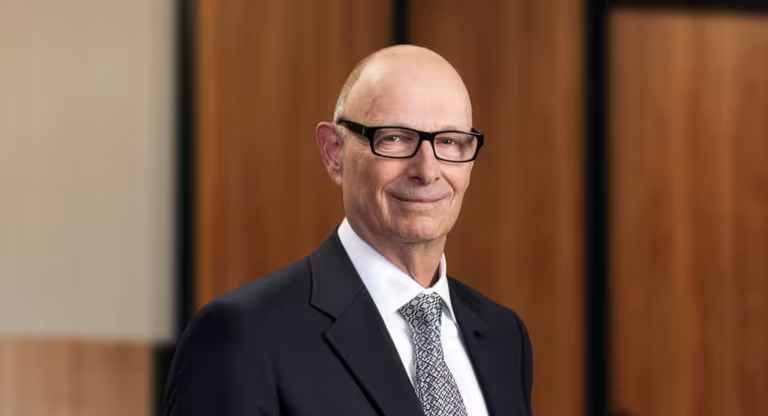 man wearing suit and glasses