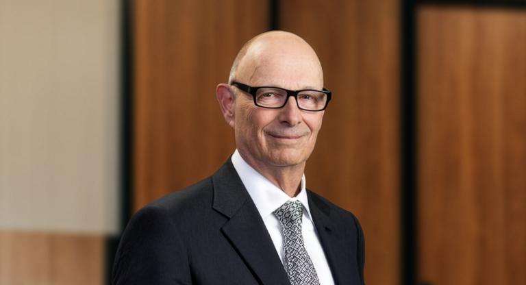man wearing suit and glasses